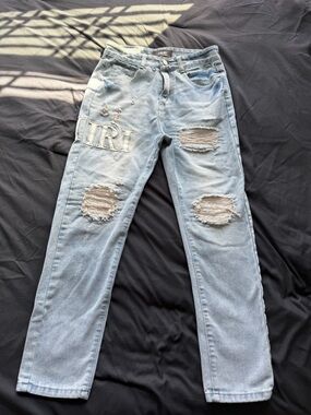 AMIRI Light Wash Distressed Jeans